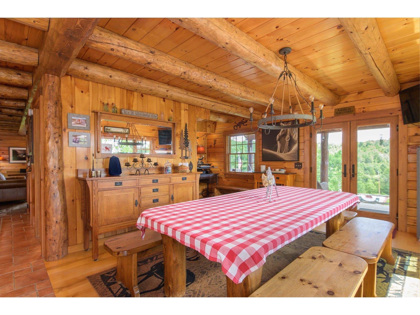 with access to covered front porch and side deck...