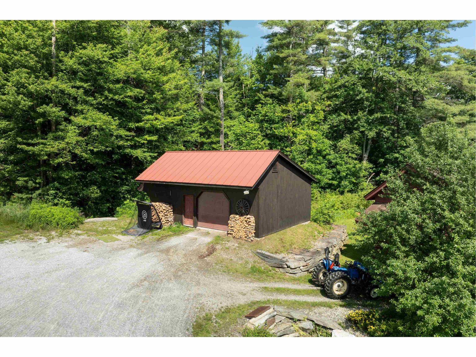 Detached, heated garage with workshop...