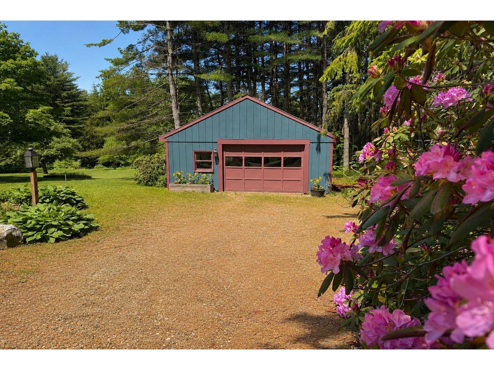 Detached garage for extra storage and outdoor toys