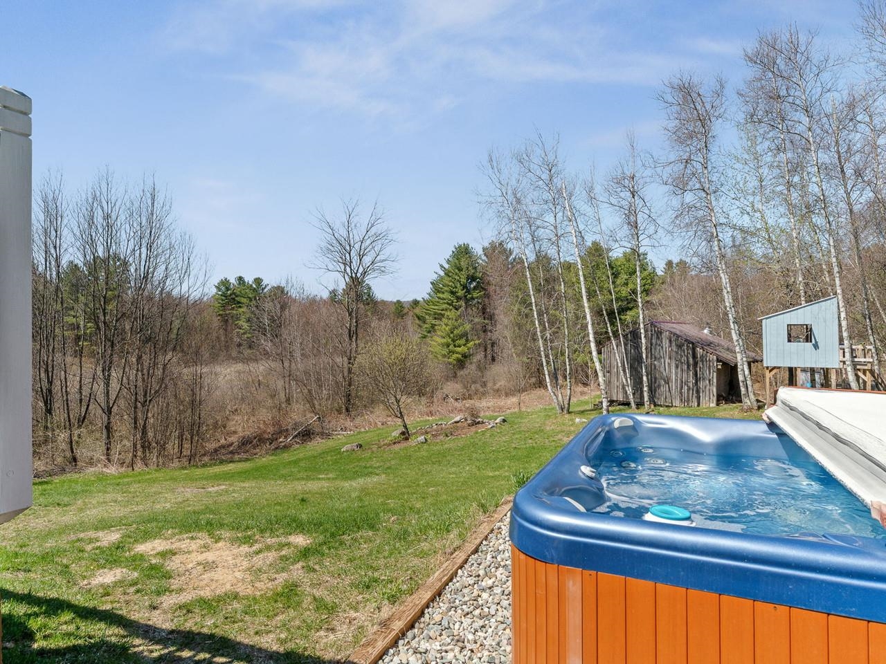 Backyard view with hot tub