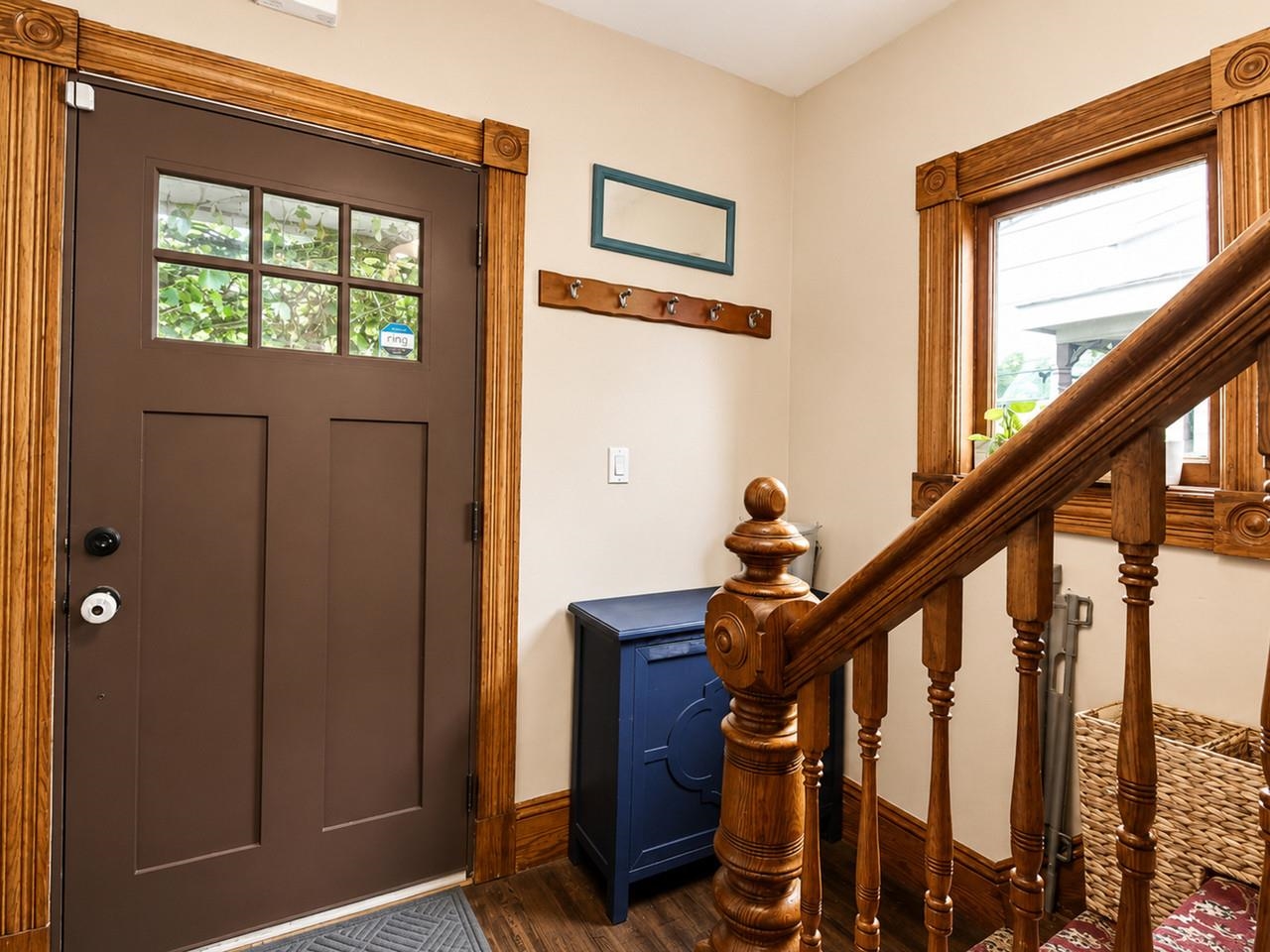 Inviting Entry with Wood Trim