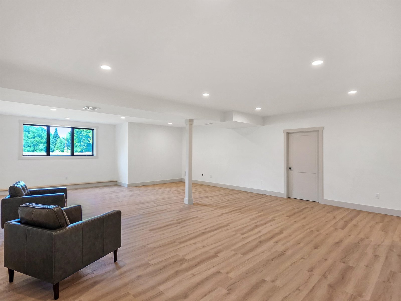 Lower Level Offer Endless Possiblitiies for Work, Hobbies, Exercise, or Family LIving