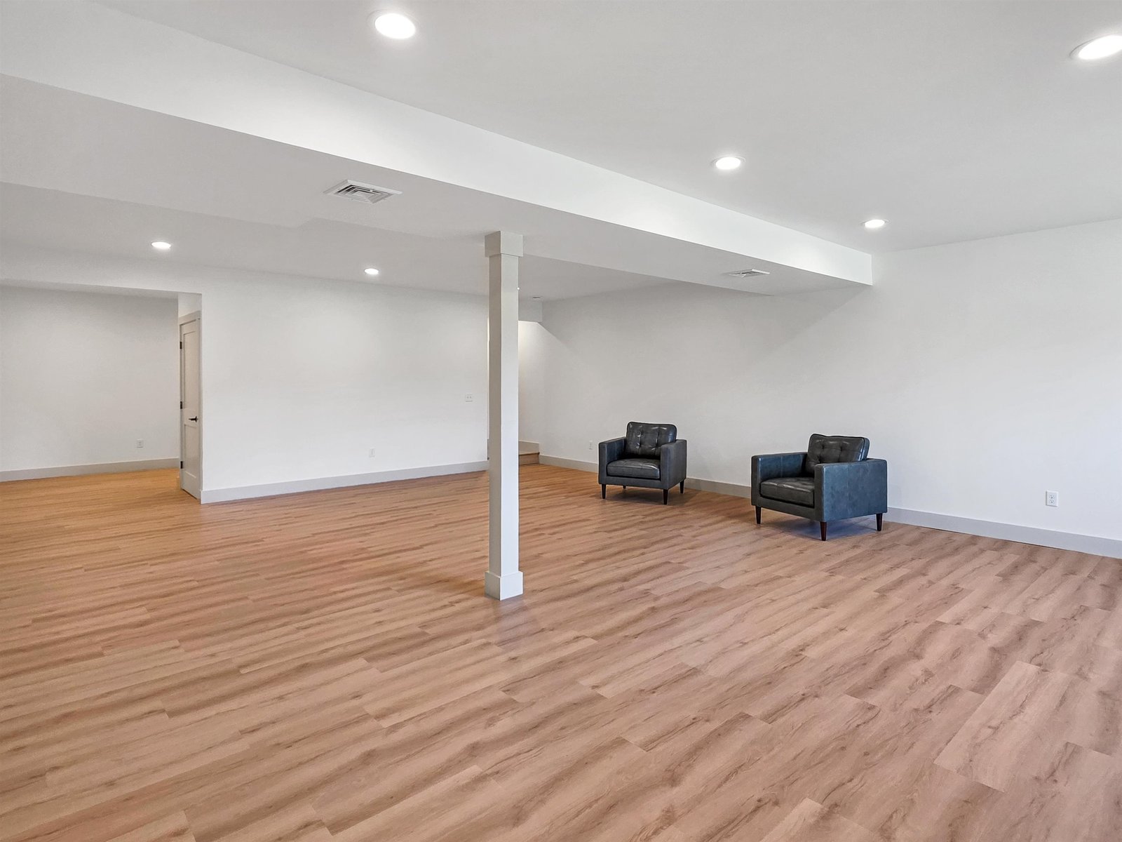 A Multi-Purpose Egress Space for a Home Gym, Guests, and More Designed to Grow with Your Lifestyle