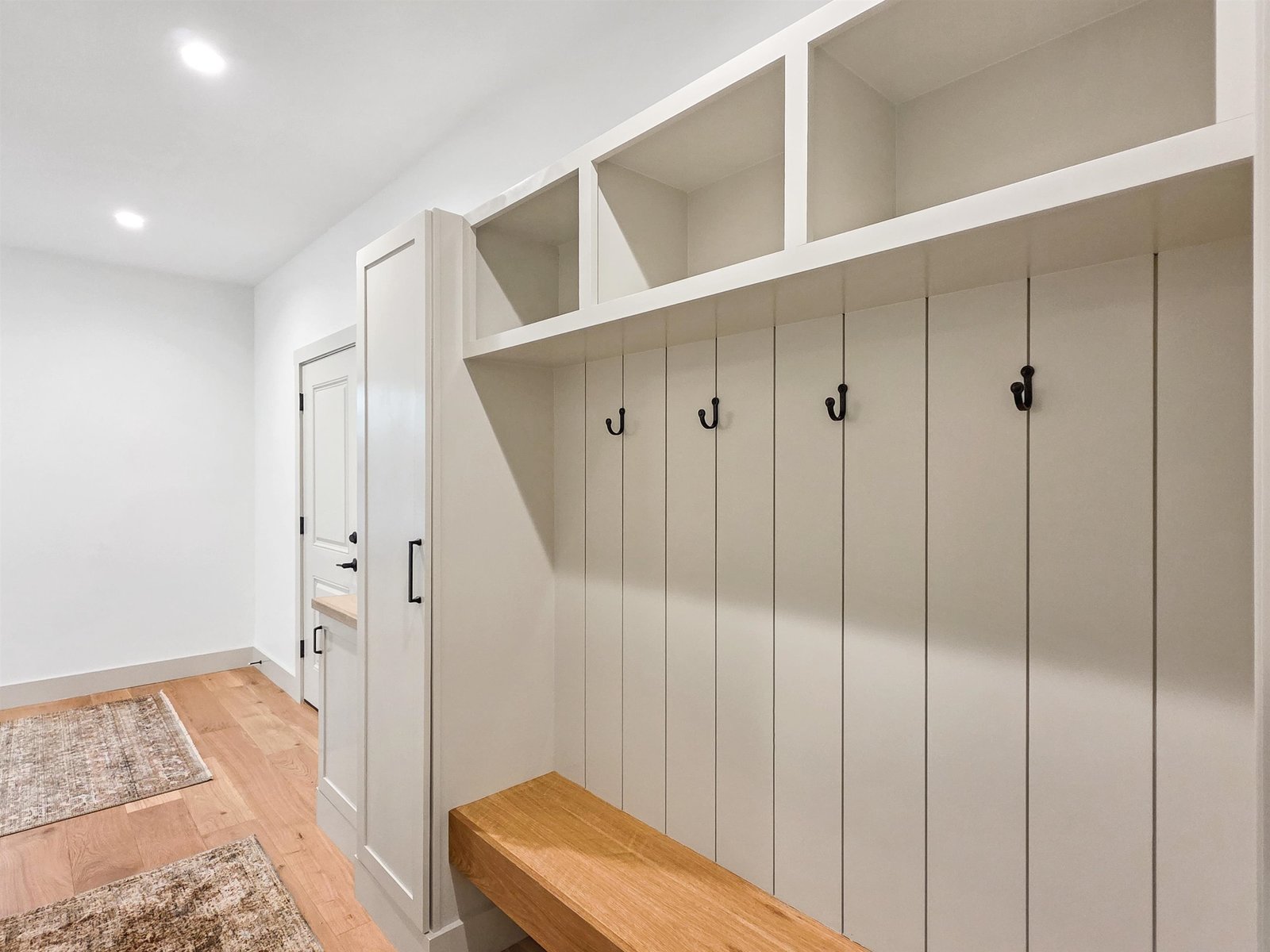 Custom Mudroom with Closets, Storage, and Bench Seating!