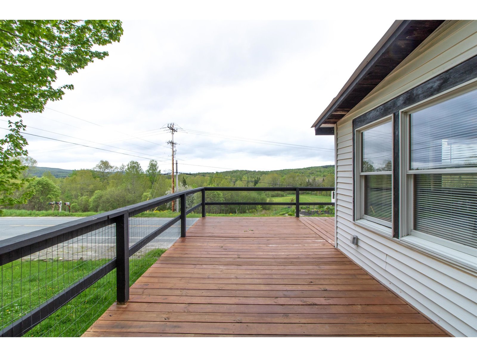 large deck connected to entry way