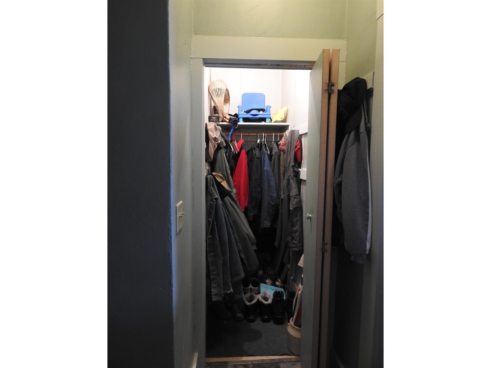 Coat closet in entry from screened porch