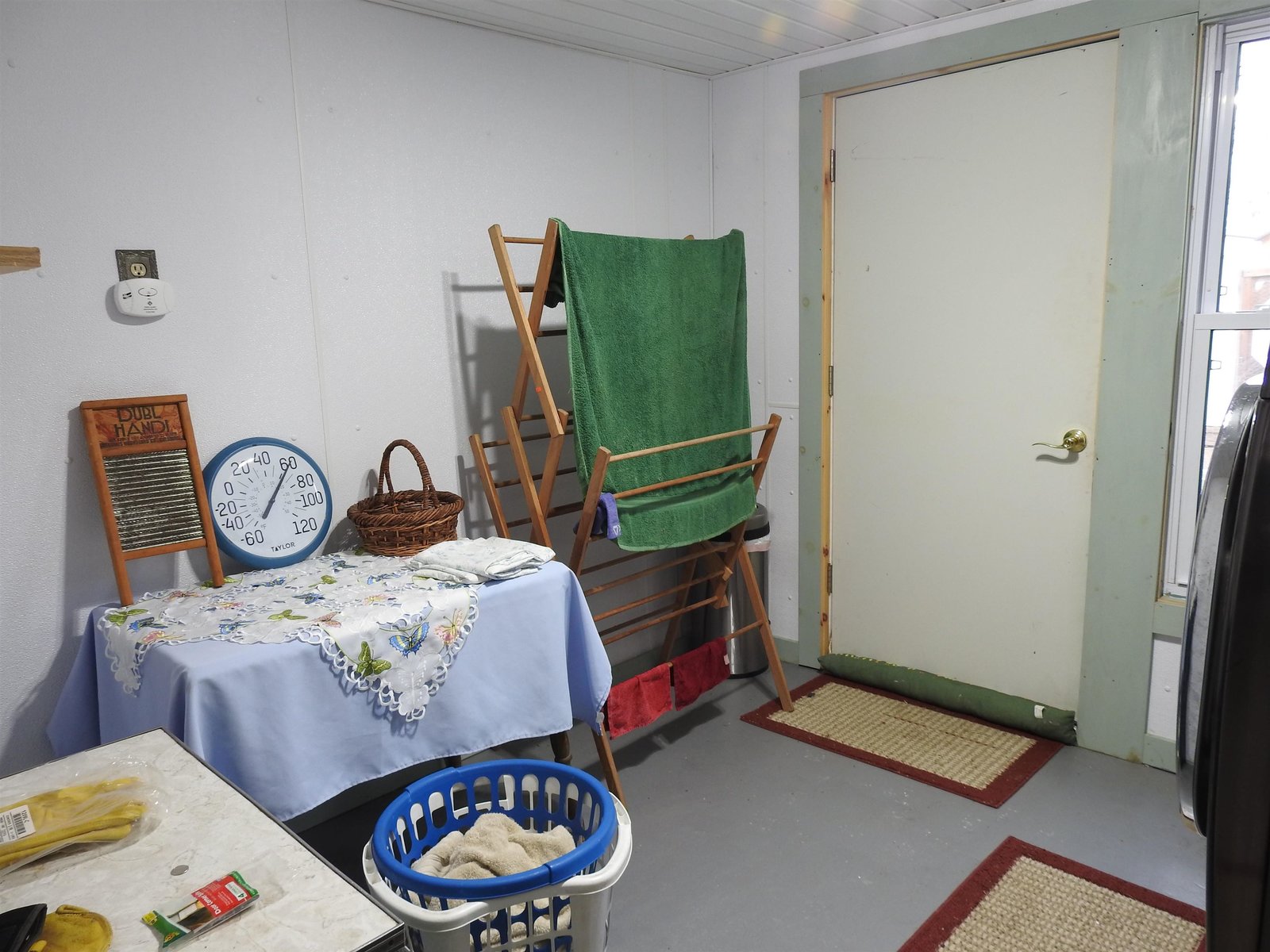 Laundry room with access to back lawn