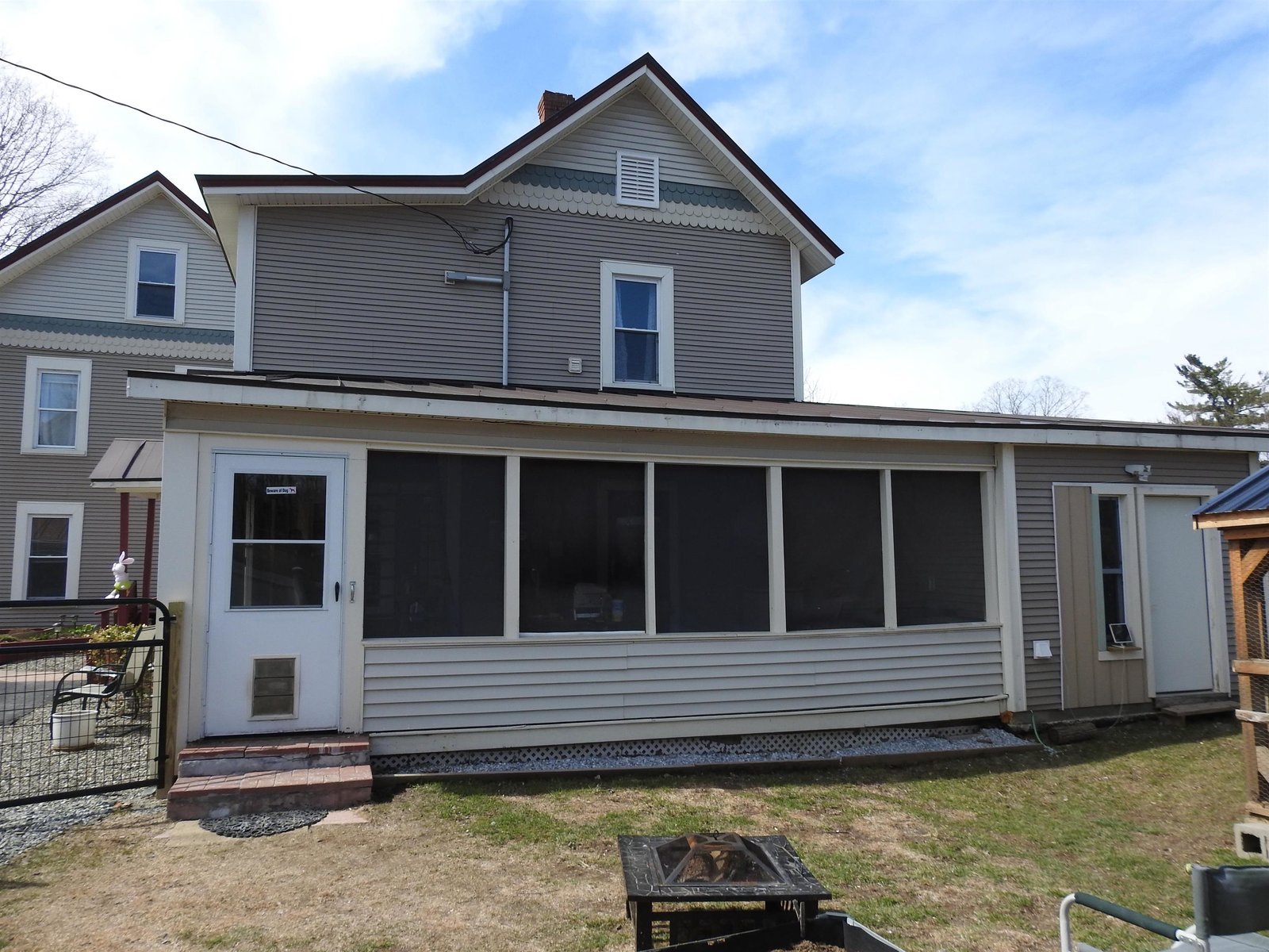 Screened porch on back of house