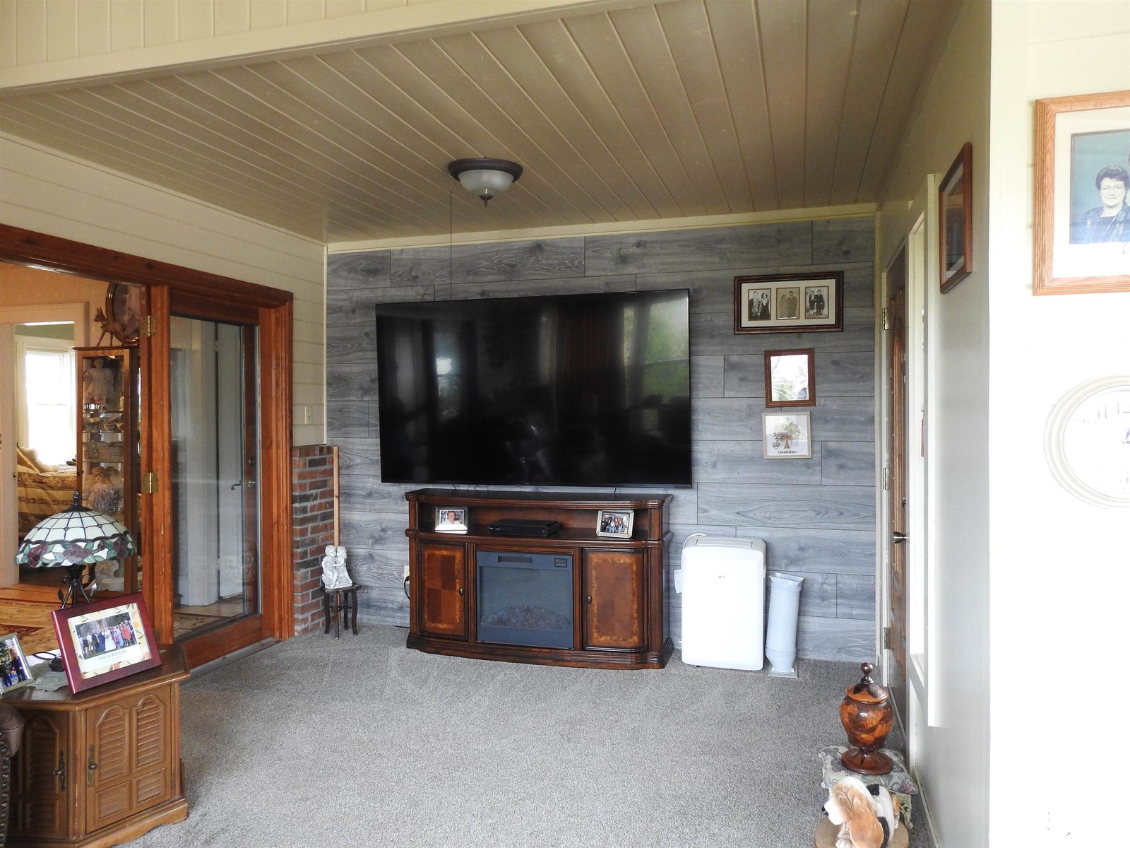 Family room with access to front porch on the right