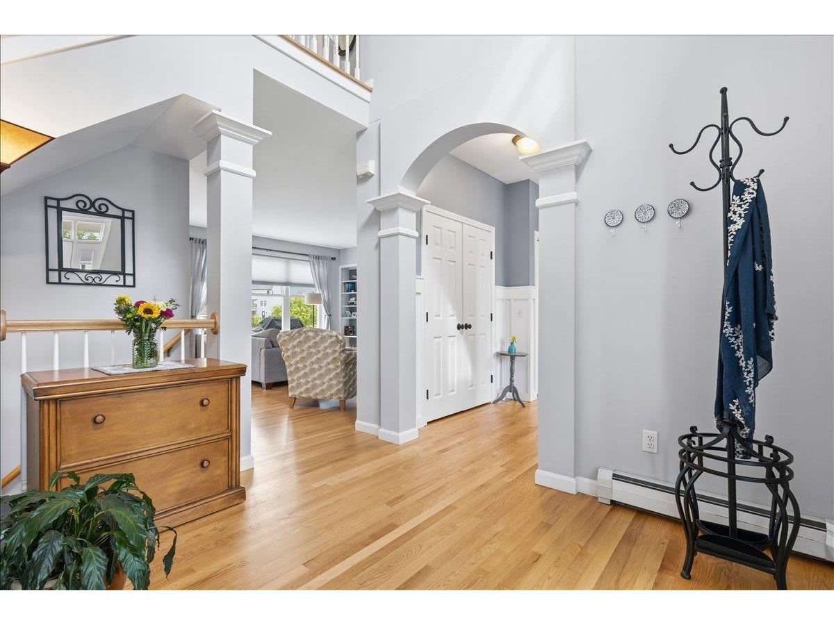 Foyer leads to pantry, mudroom, laundry & half bath