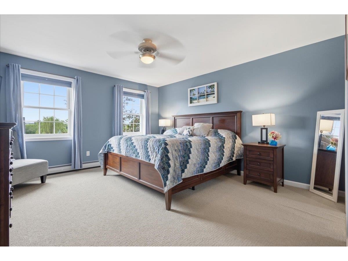 Spacious primary suite with renovated bathroom
