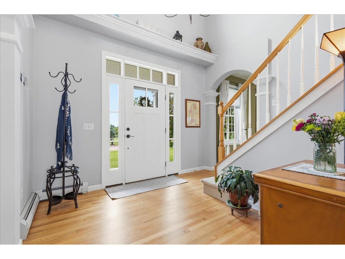 Stunning open foyer entrance with chandelier