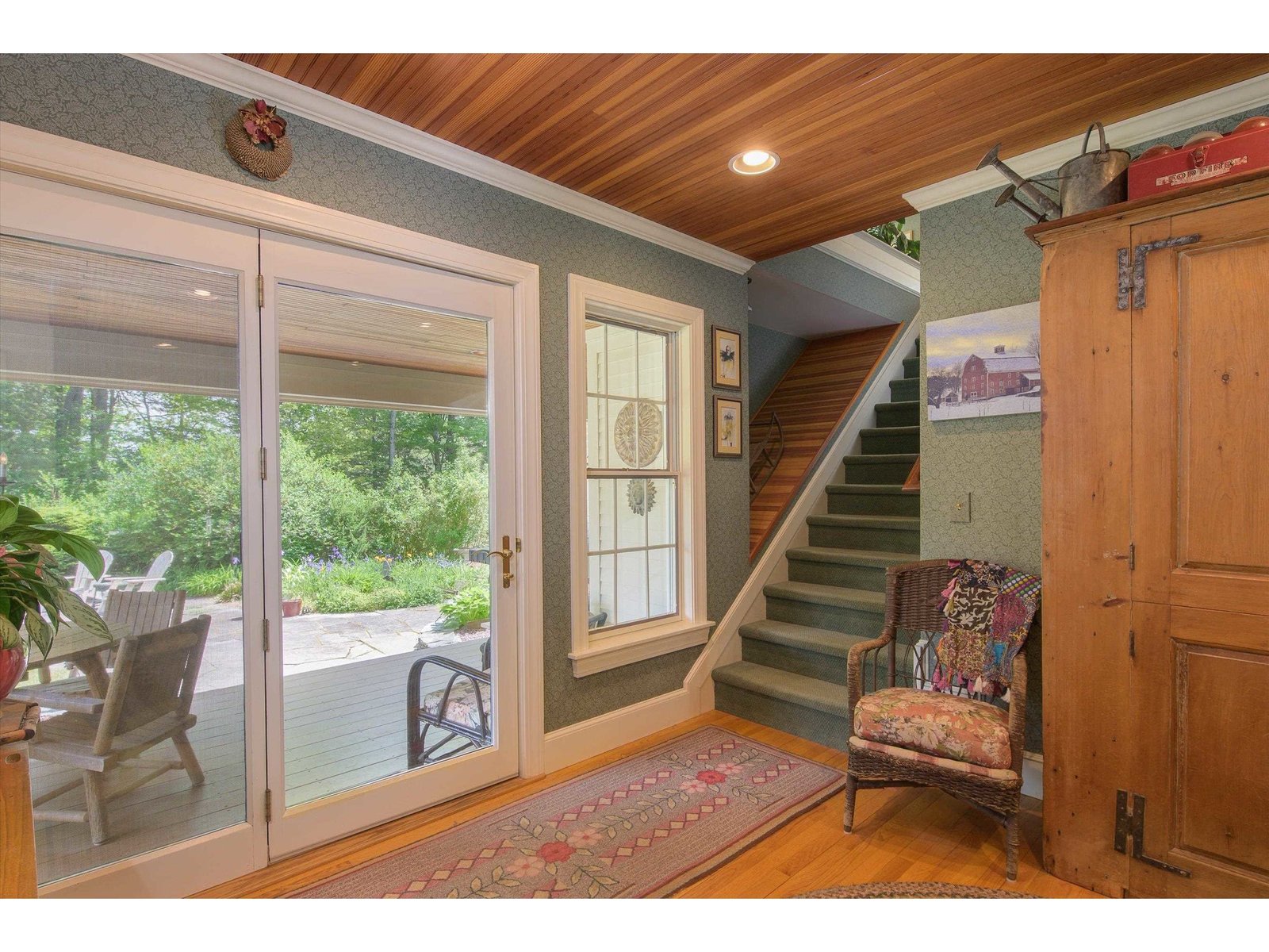 French doors to stone patio and gardens