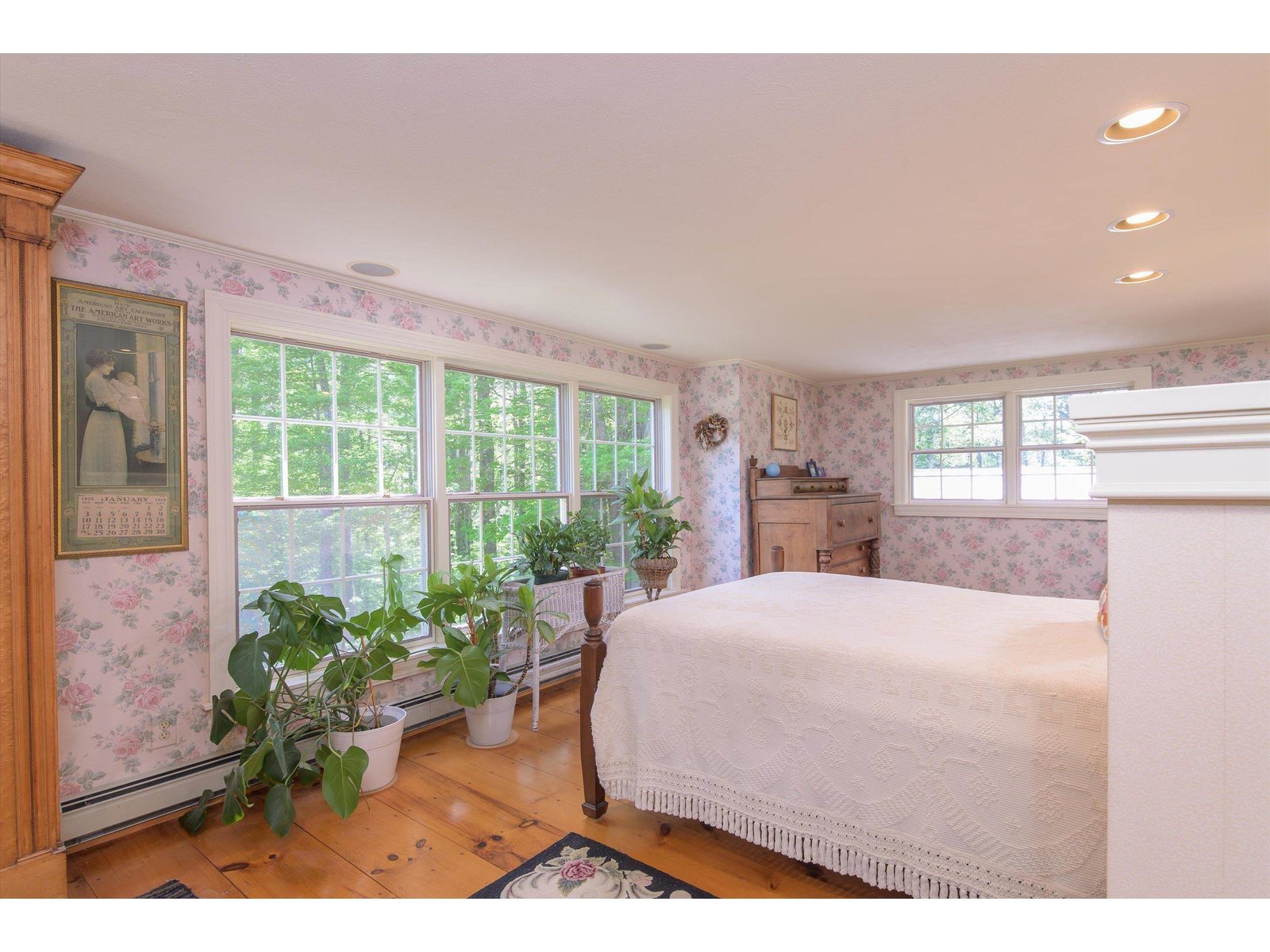 Walls of windows all around the bed