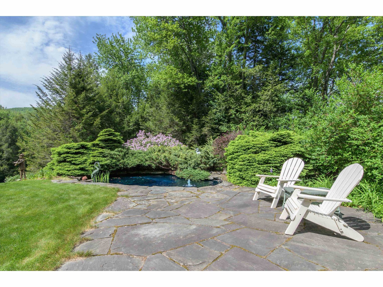 Relax by the garden fish pond