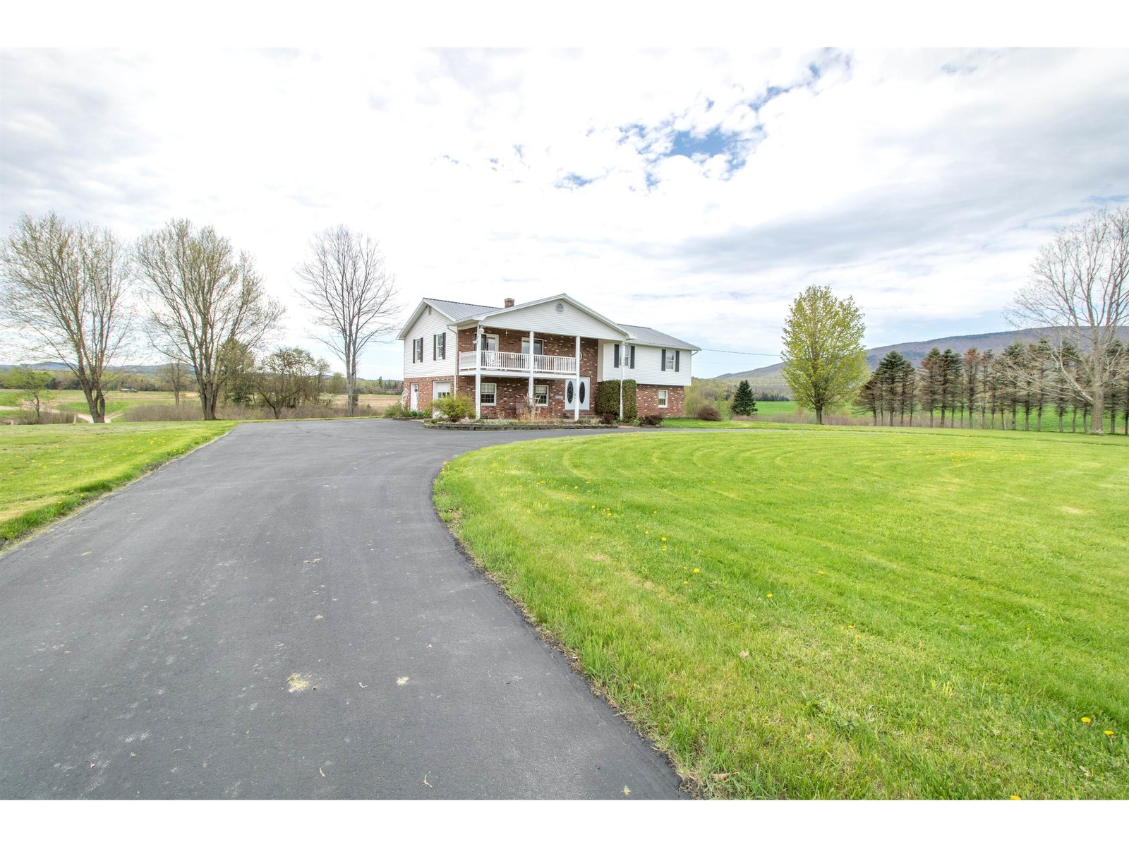 Paved Driveway and Manicured Lawn