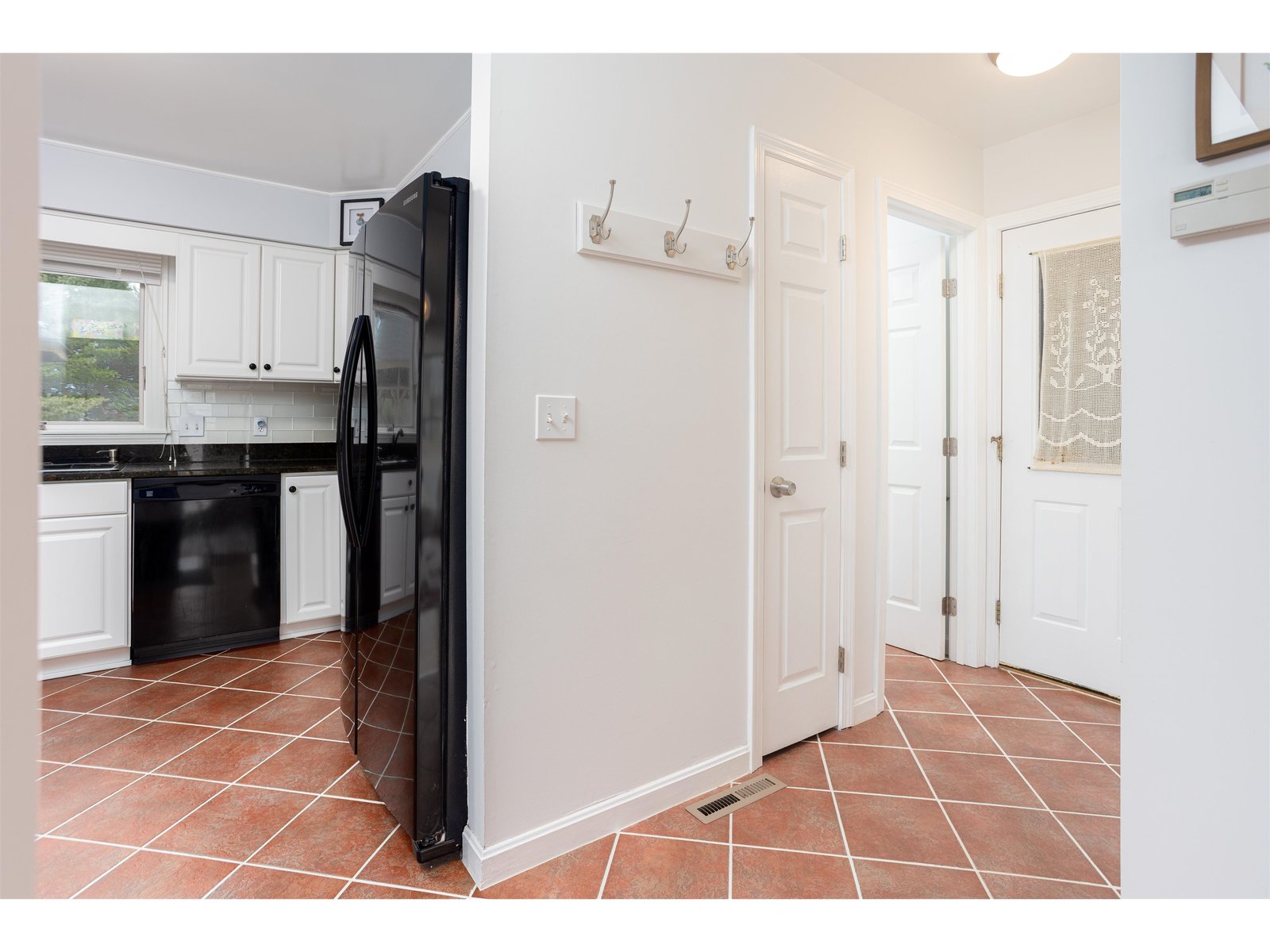 Kitchen into Foyer
