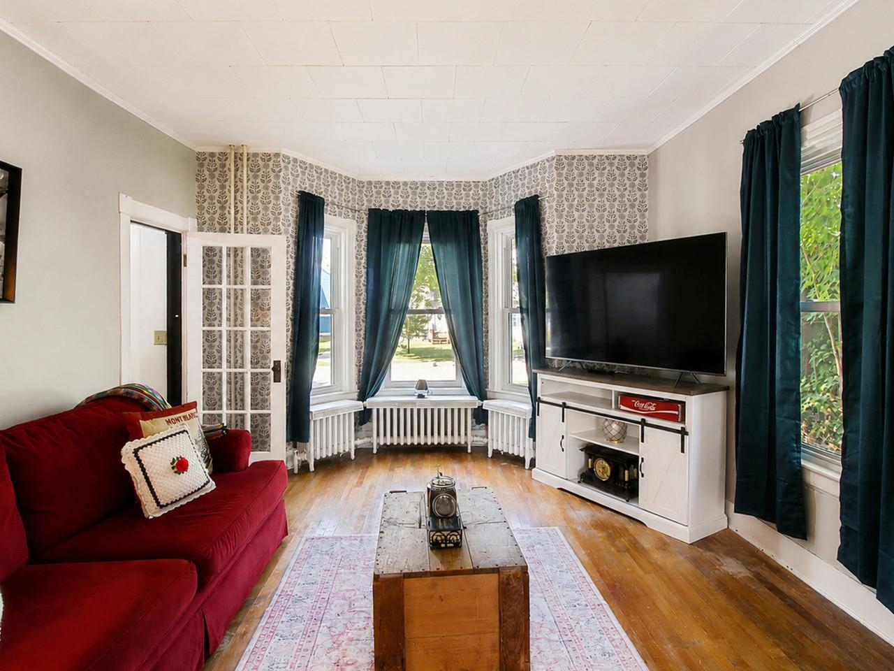Living room with bay windows