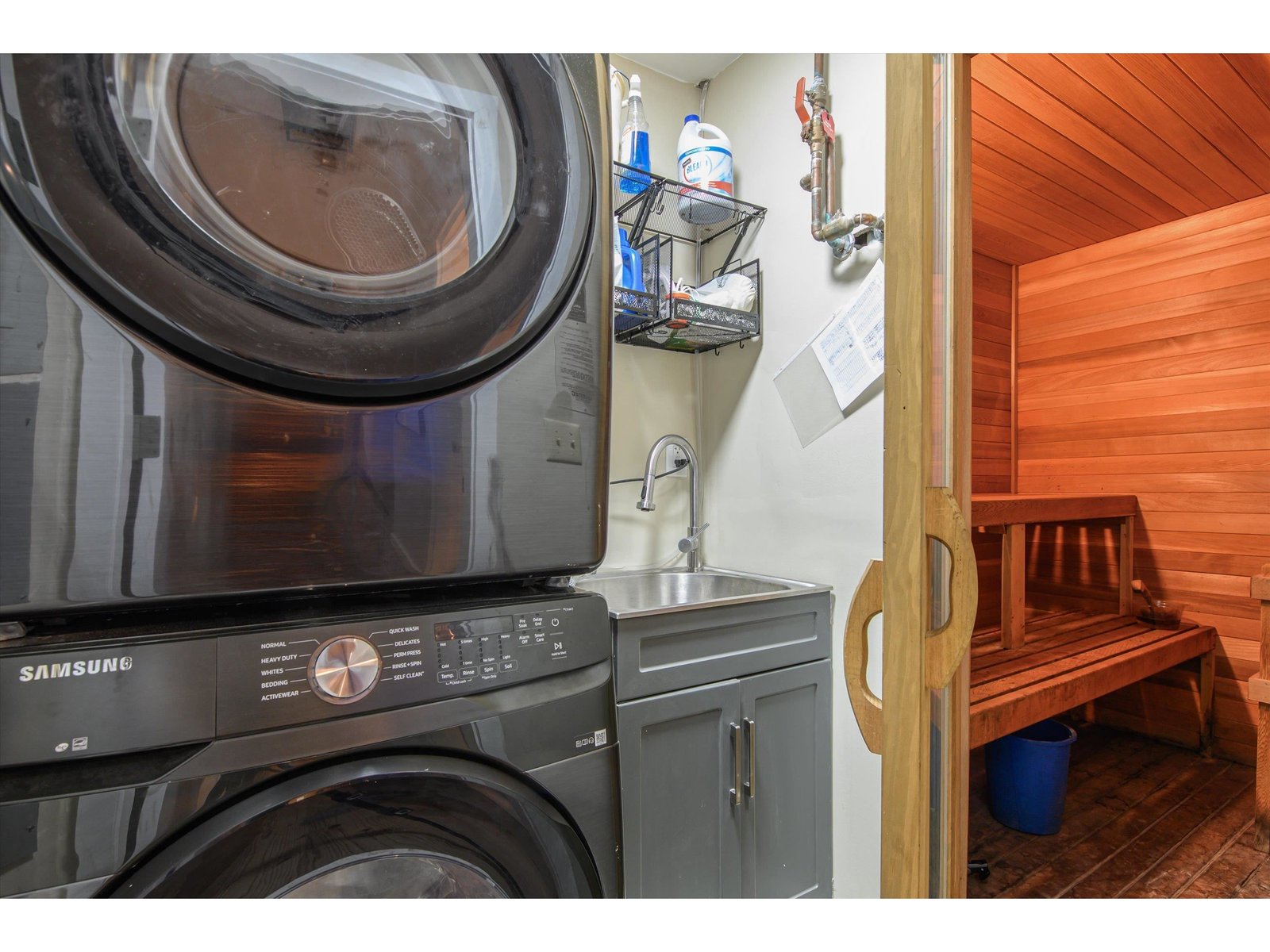 Updated laundry room with adjoining sauna