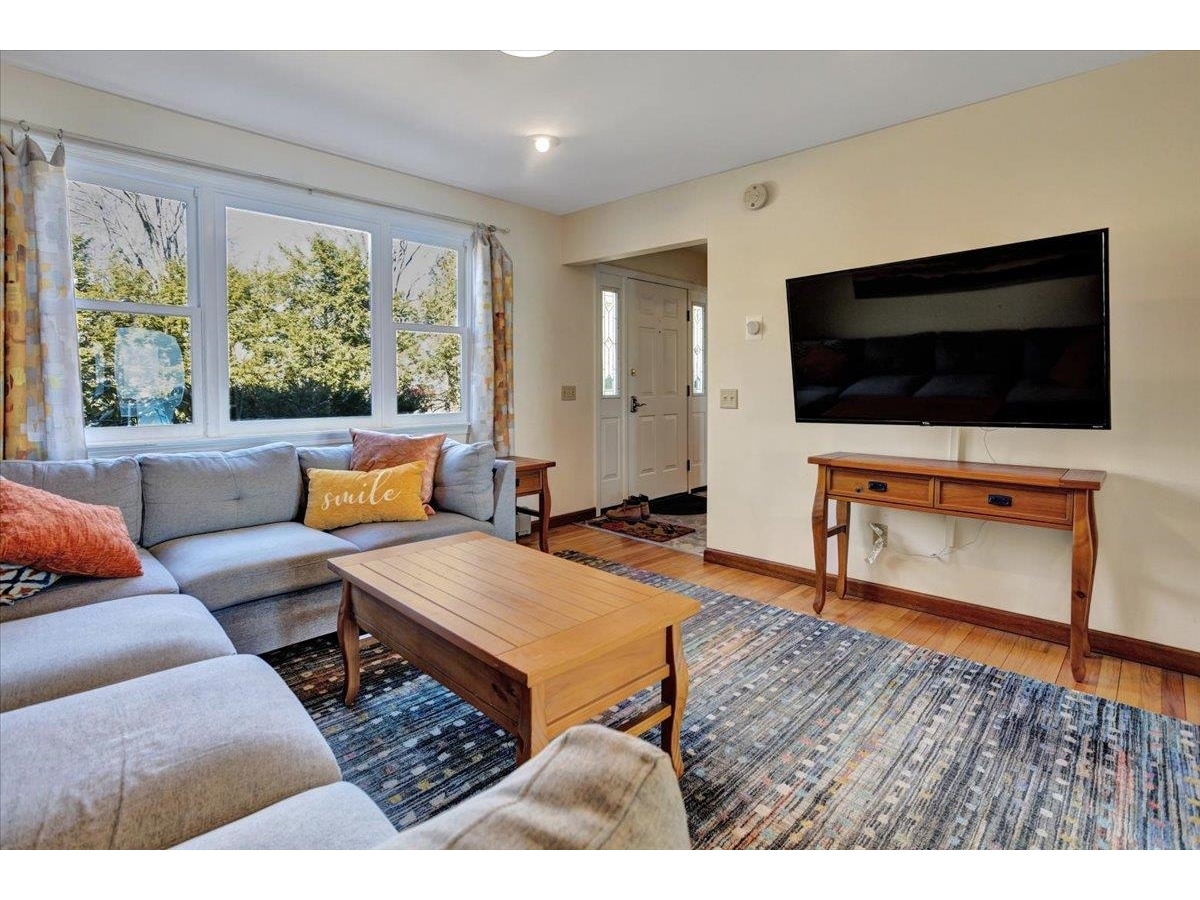 Welcoming living room with wood floors.