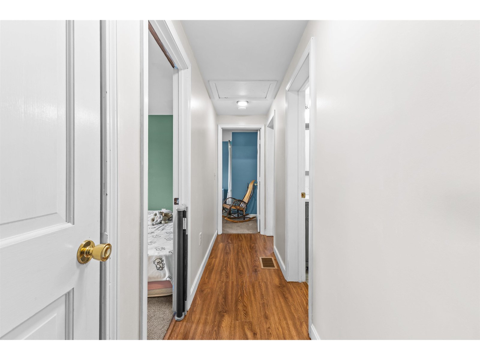 Hallway accessing the bedrooms and bath.
