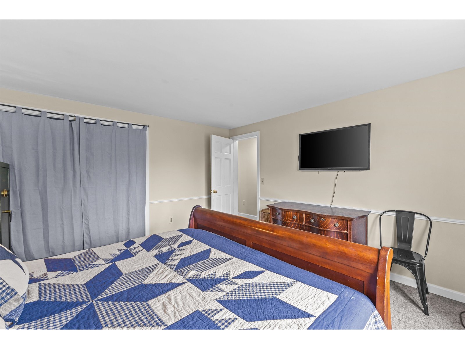 Another perspective of a bedroom.