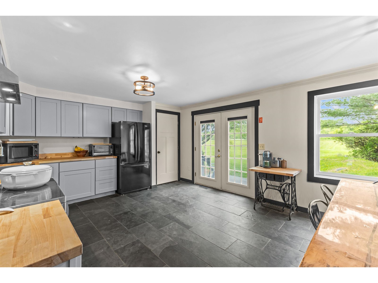 Open kitchen with eat in dining.