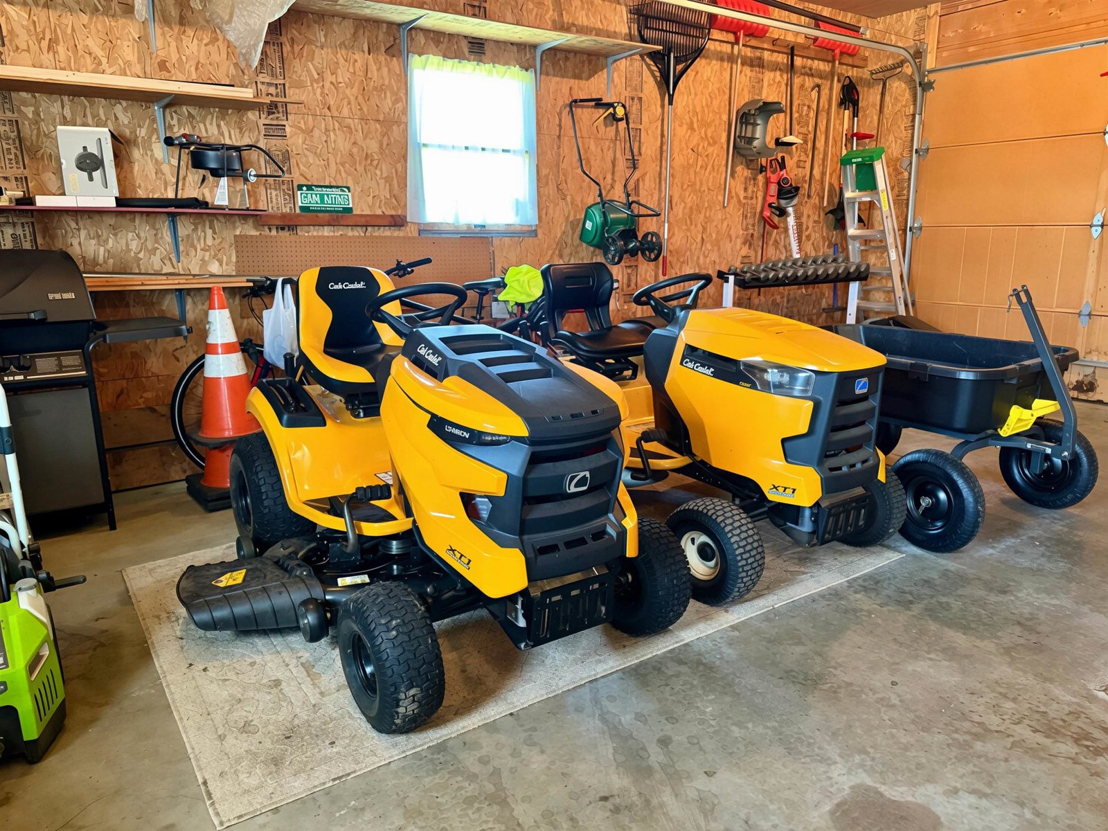 2 Mowers sold w/ property