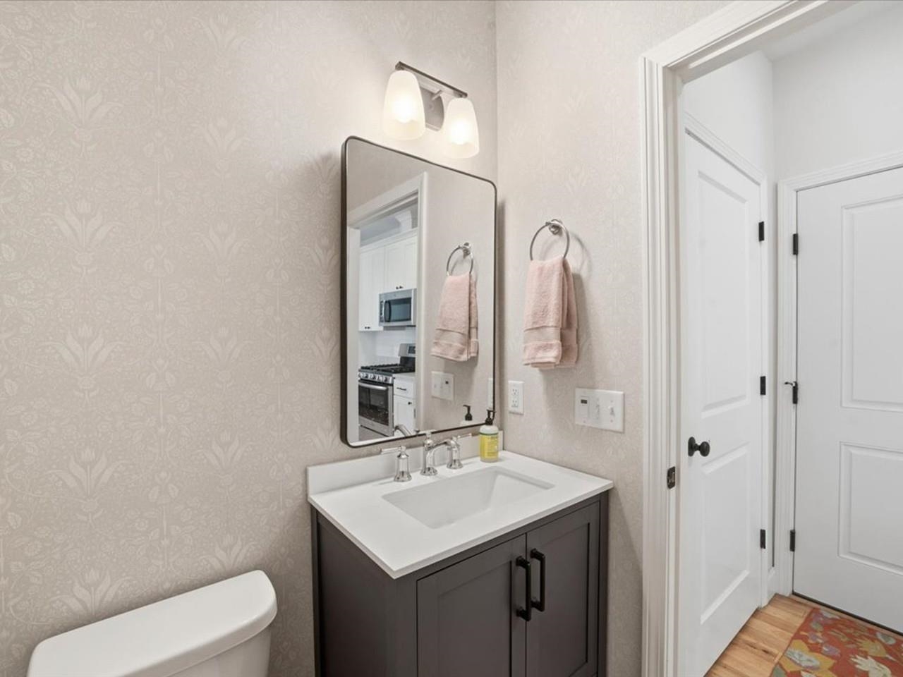 1/2 bathroom off garage entry