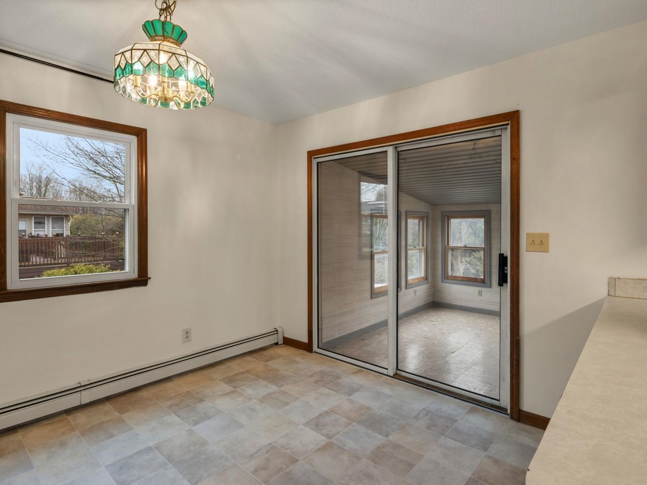 Dining Area to Enclosed Porch