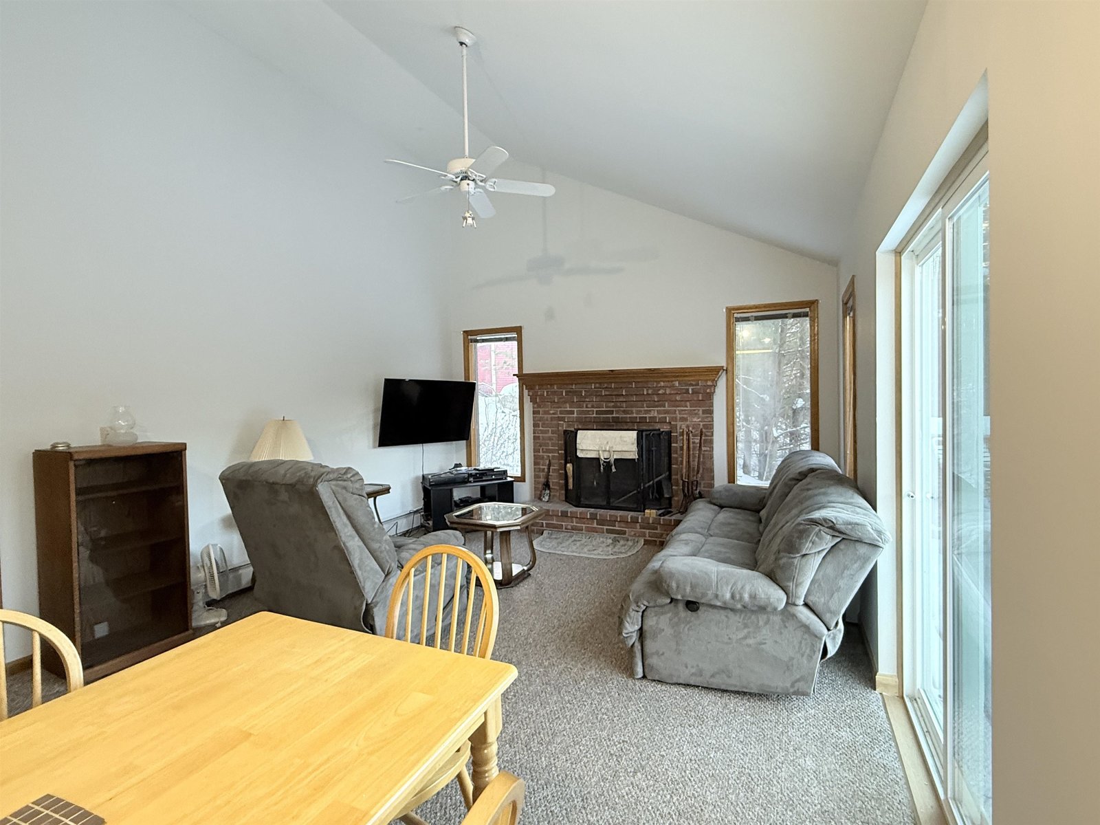 Living dining area with vaulted ceiling