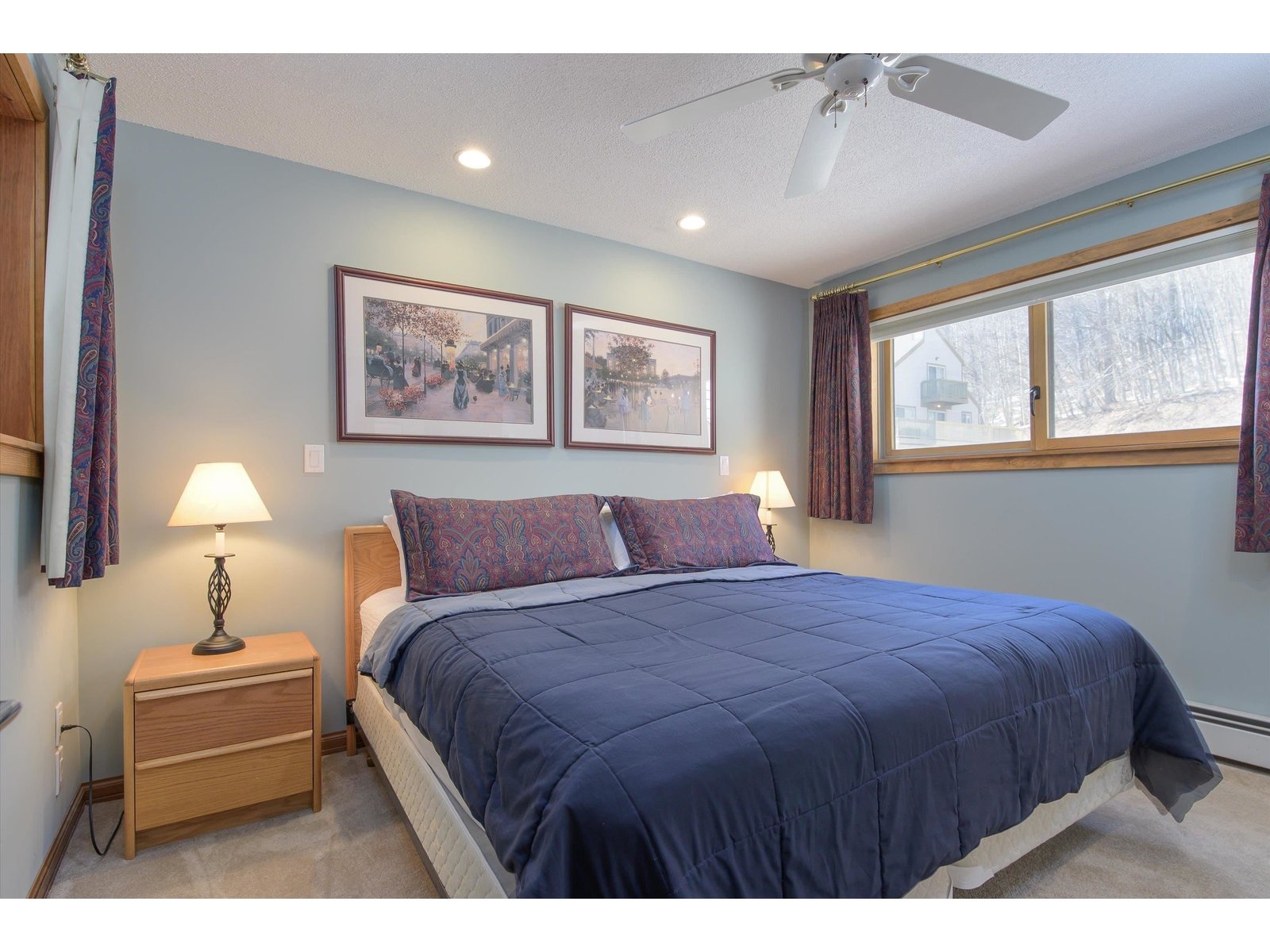 Primary bedroom witrh ceiling fan and recessed lighting