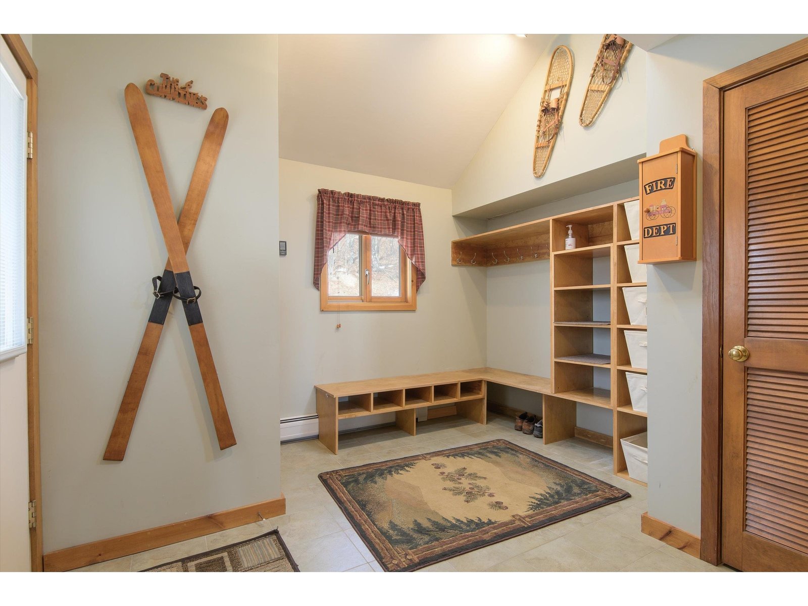 Expanded mudroom with built ins