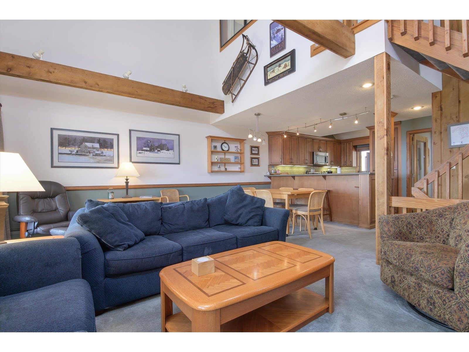 Open living design with open beam cathedral ceiling