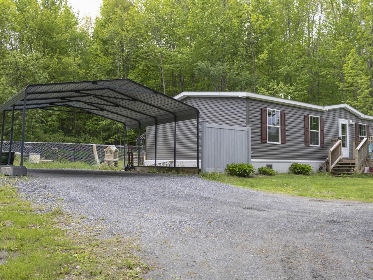 Spacious driveway & carport