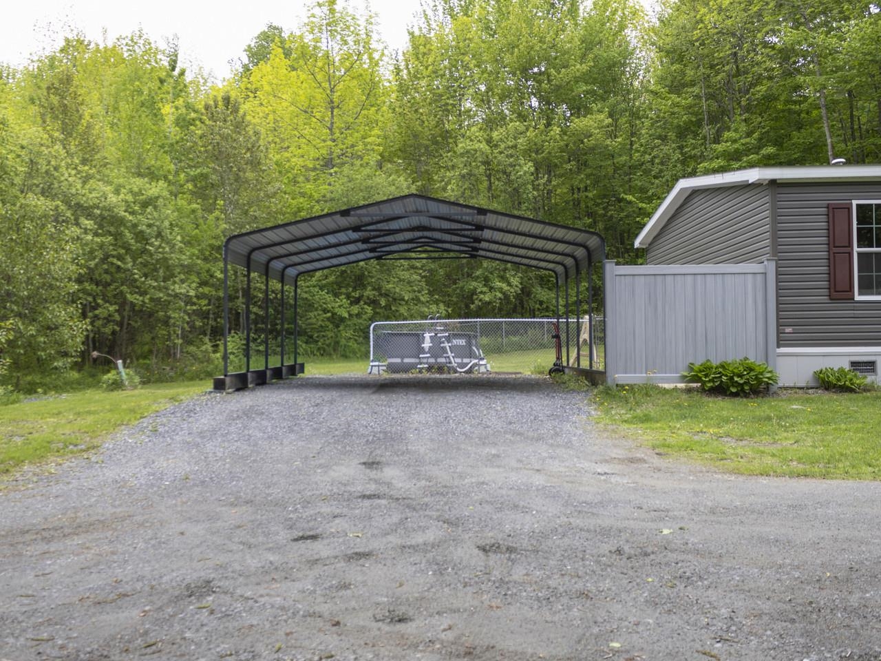 Spacious drive & carport