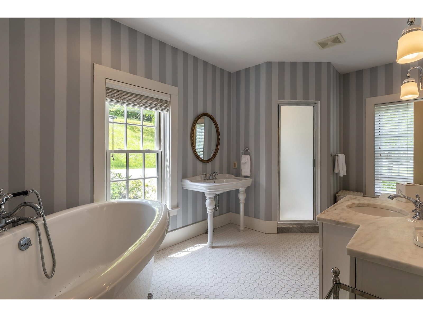 Primary clawfoot tub and shower