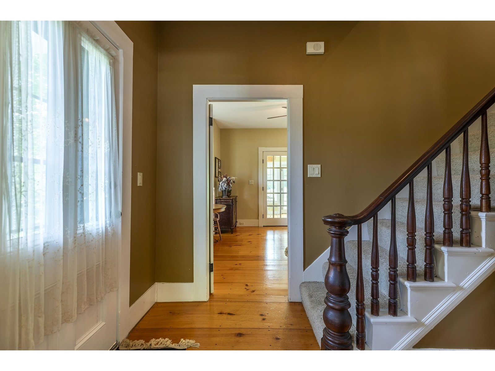 Classic central stairs off entry