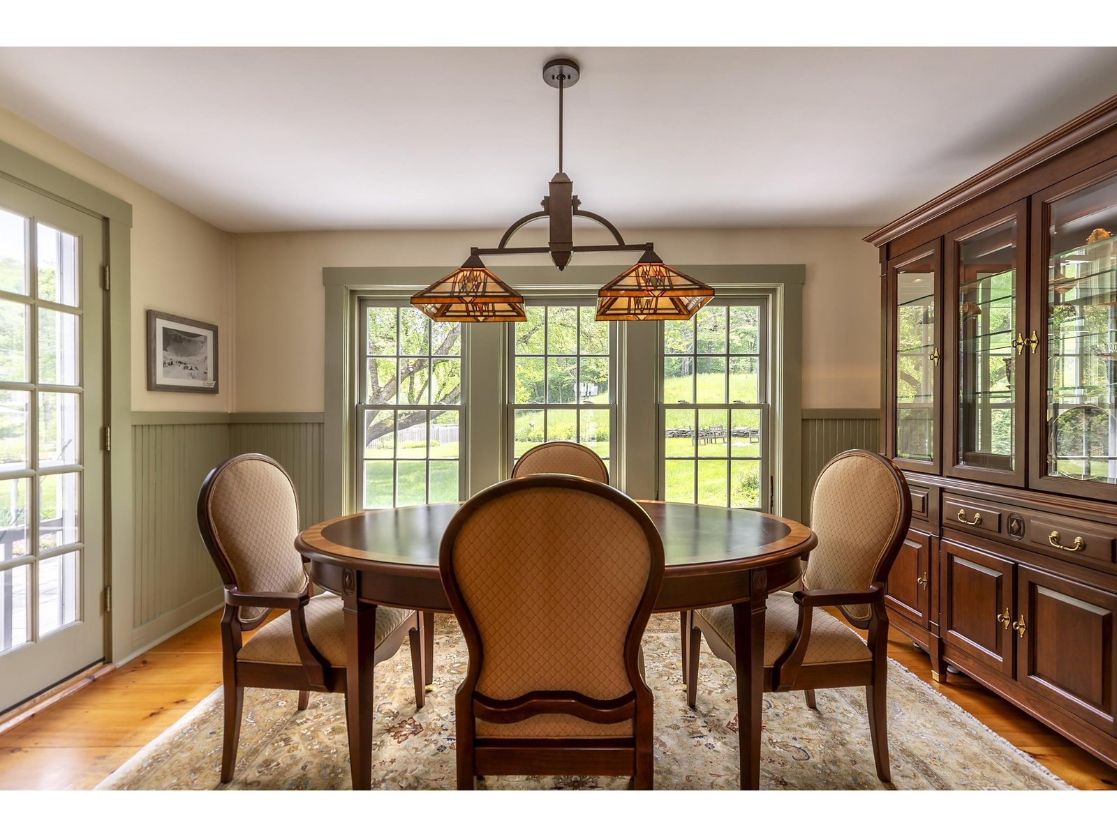 Dining with French doors to patio