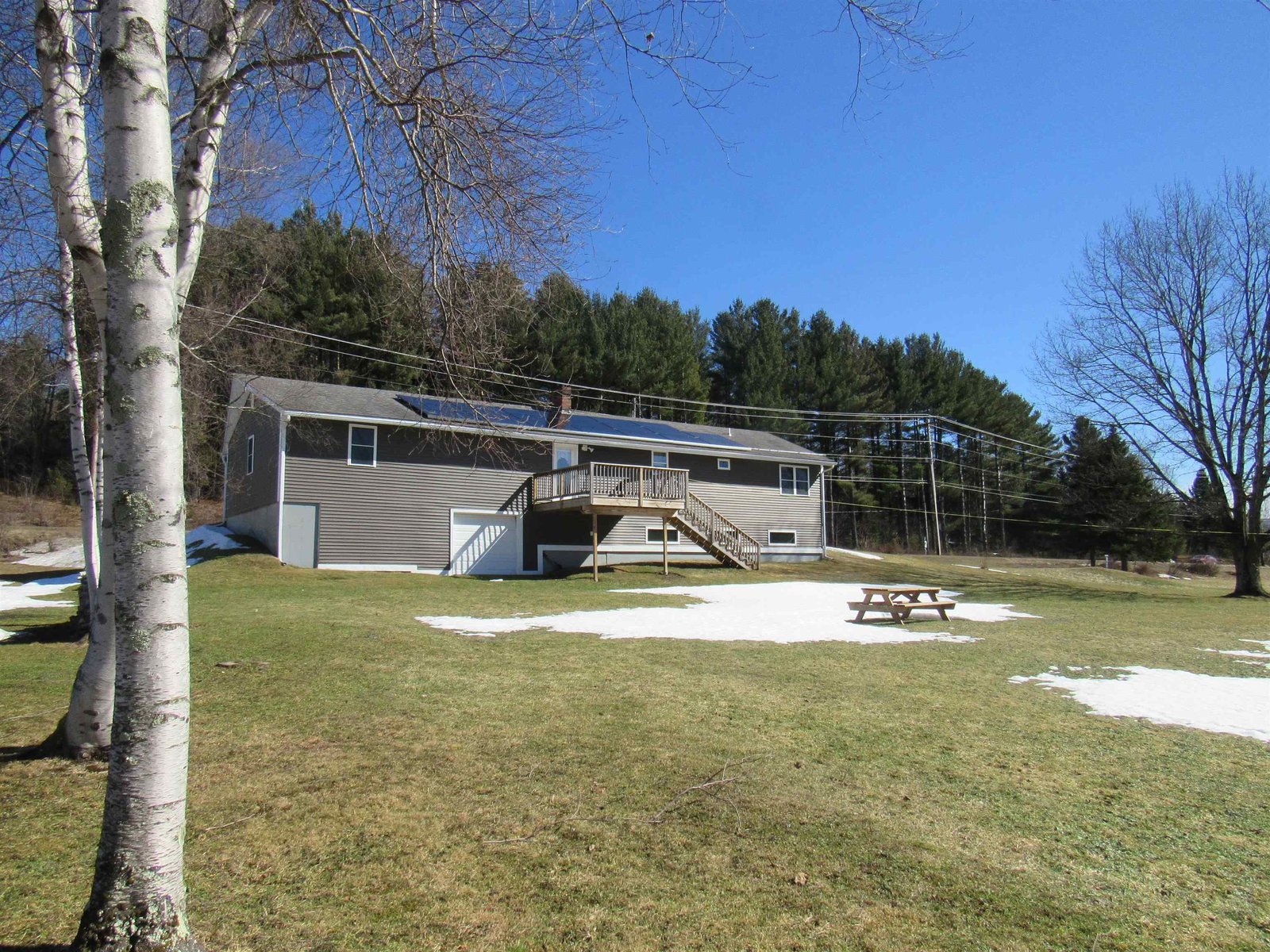 House from Back Yard, Deck & Utility Garage