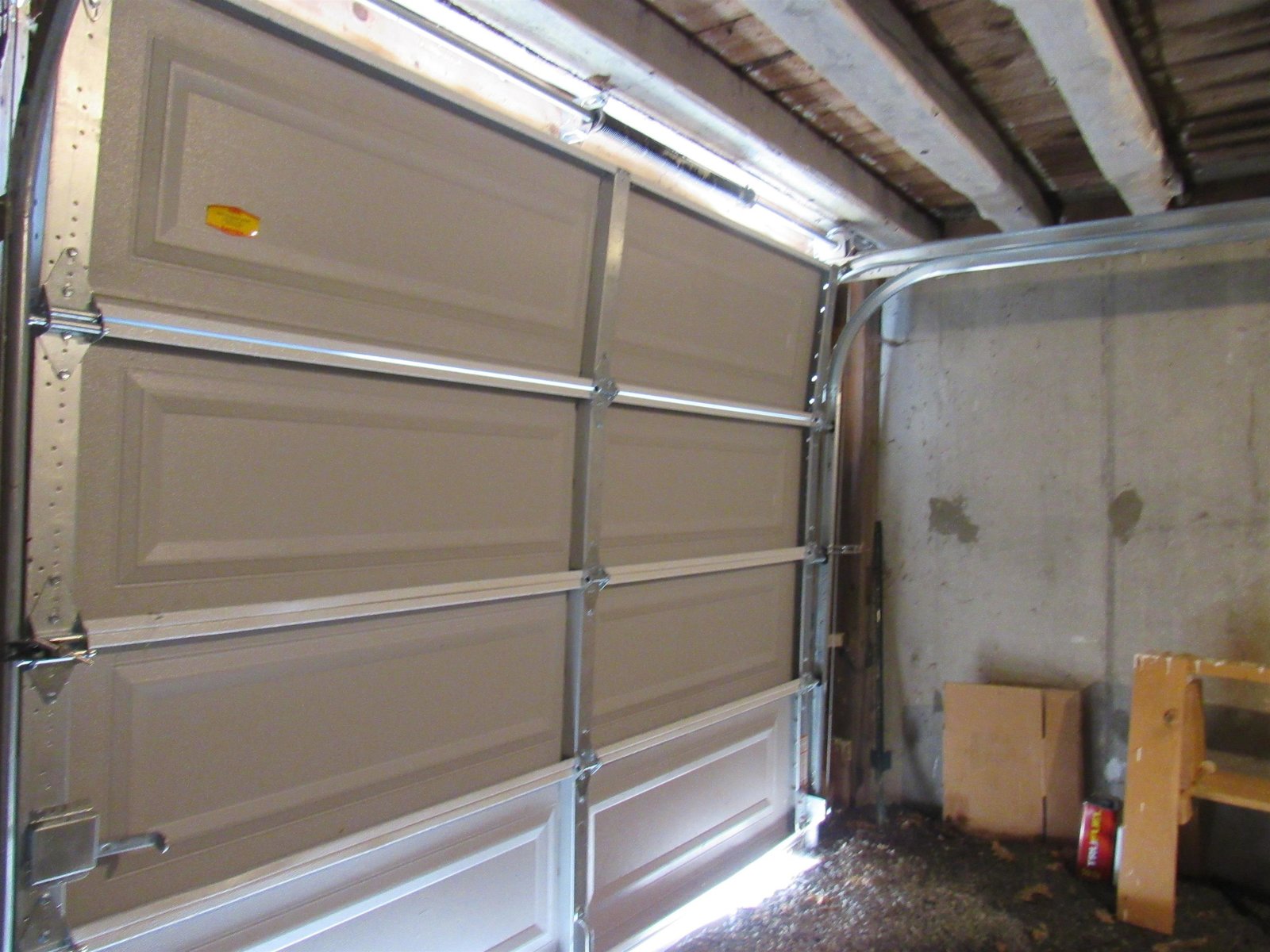 Lower Level Garage Perfect for Your Mower and Extras
