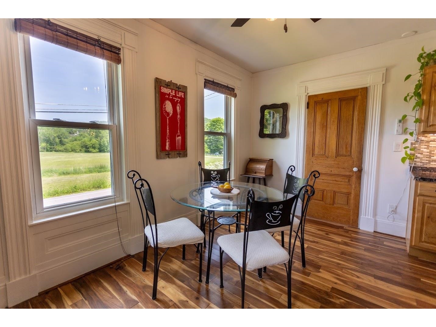 Kitchen has an eat-in area- View of meadow out the window