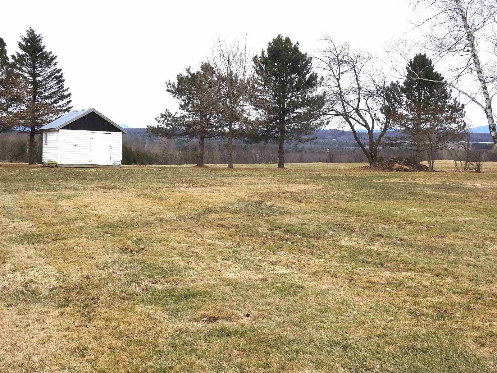 Lawn on left of house.