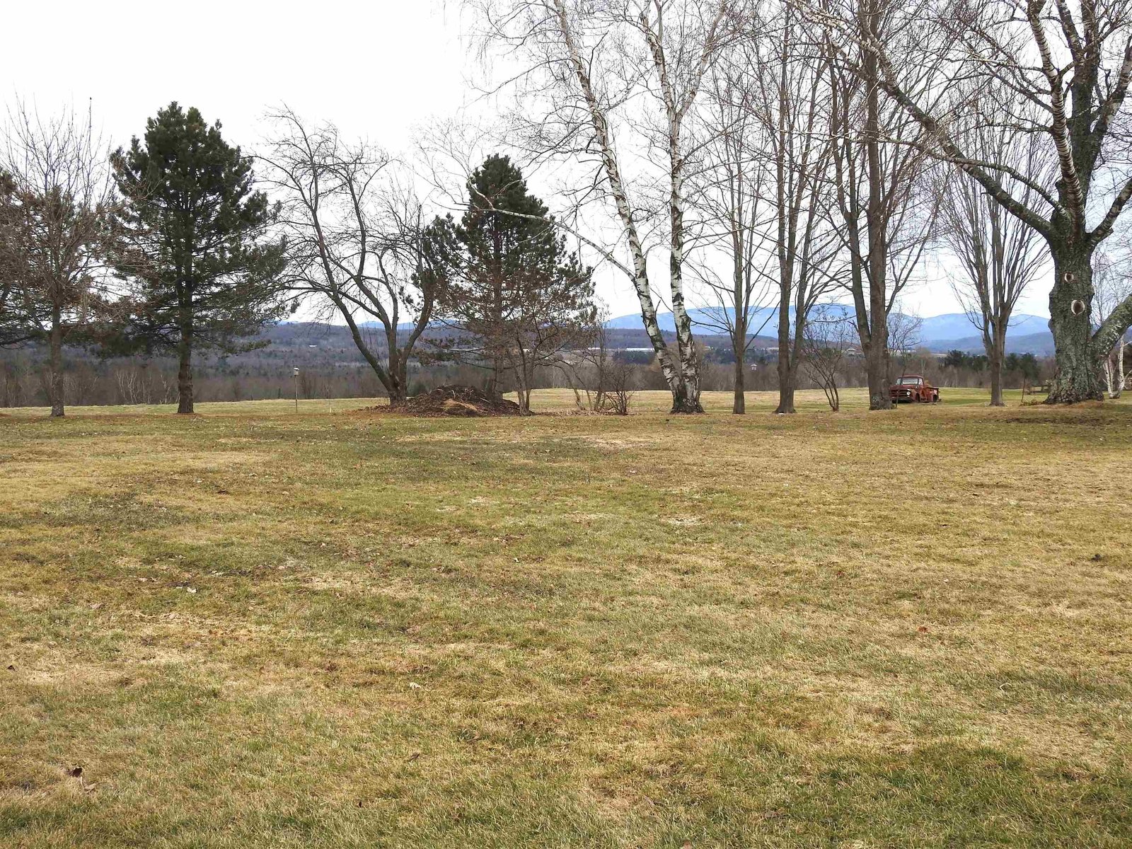 Views from back lawn and enclosed porch.