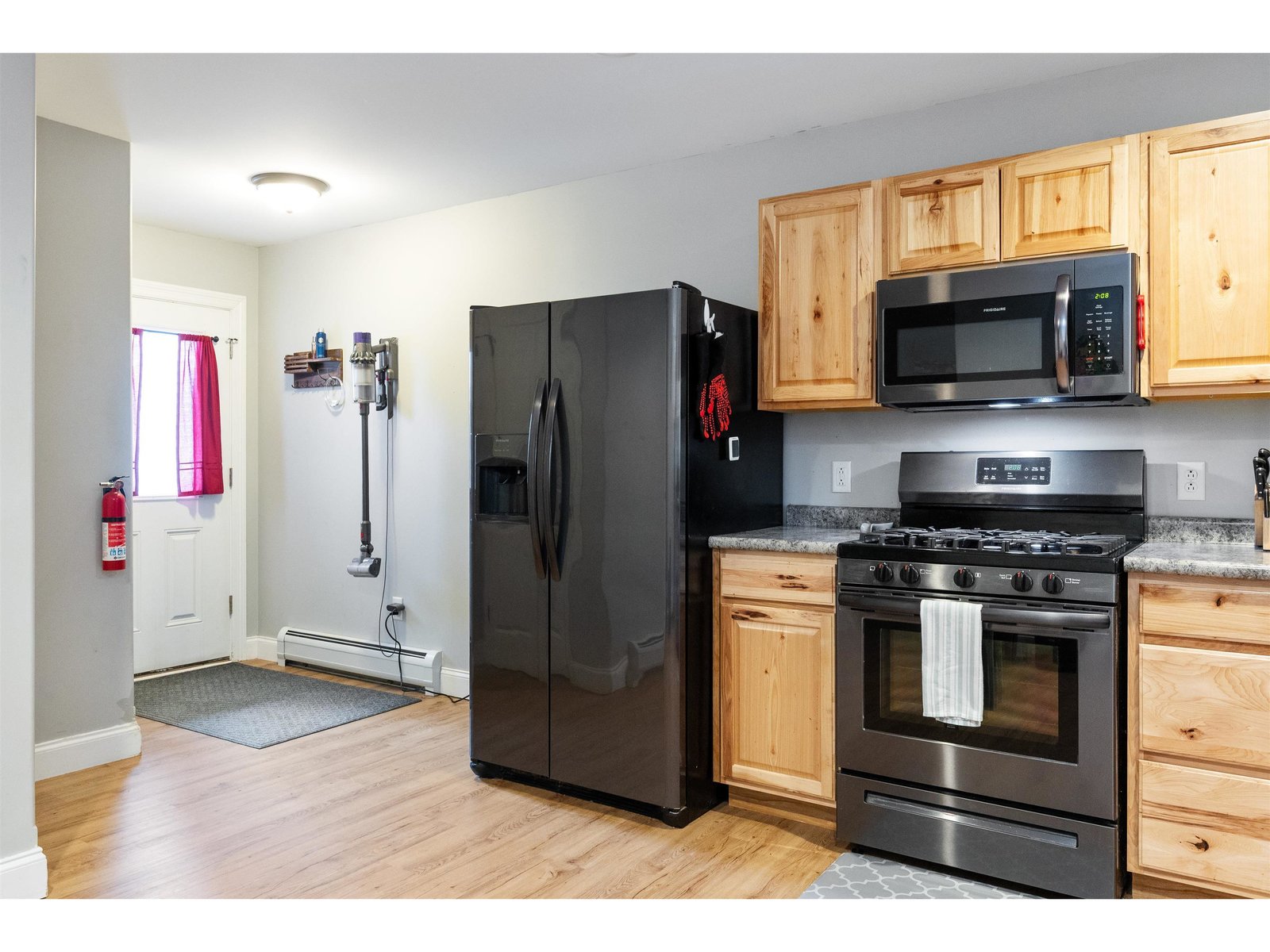 Open concept kitchen with gas range