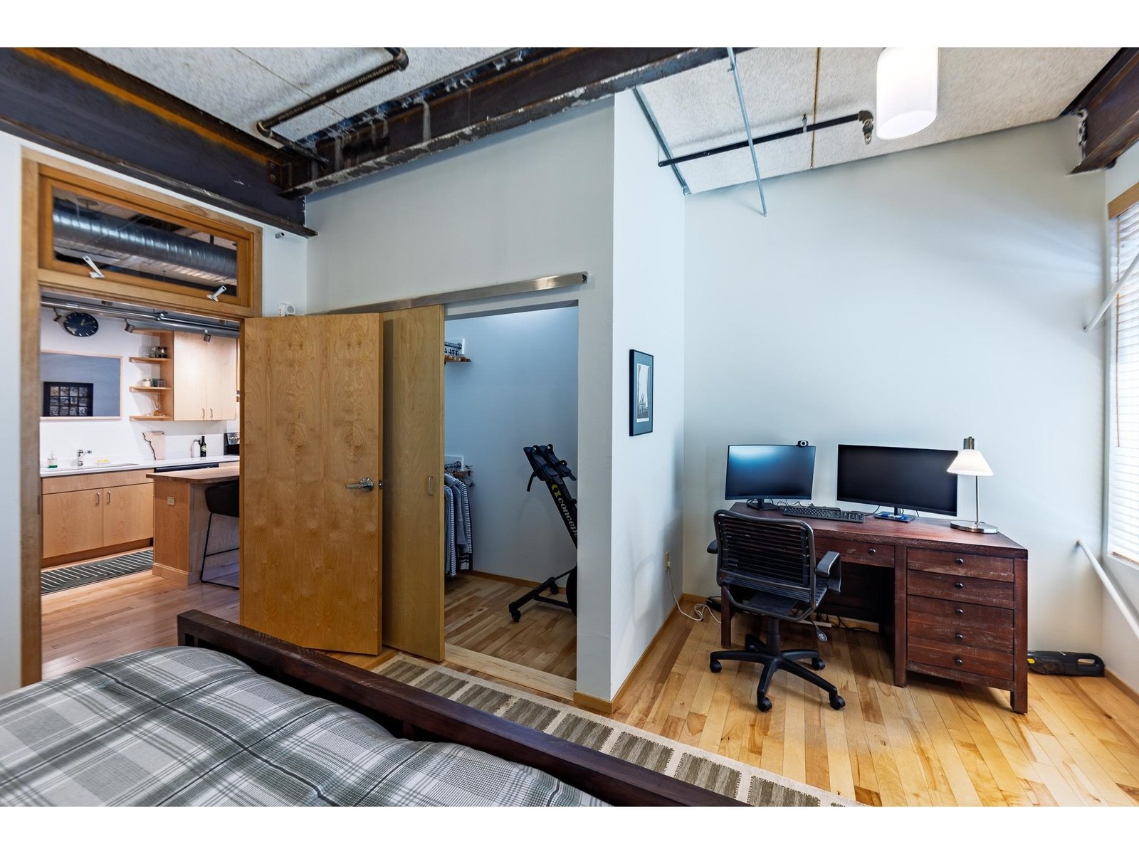 Office space and large walk-in closet in primary bedroom