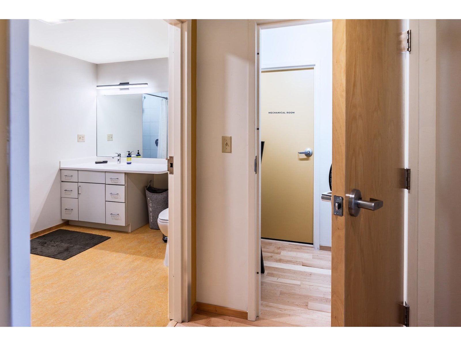 3/4 bath and storage area at end of the hallway