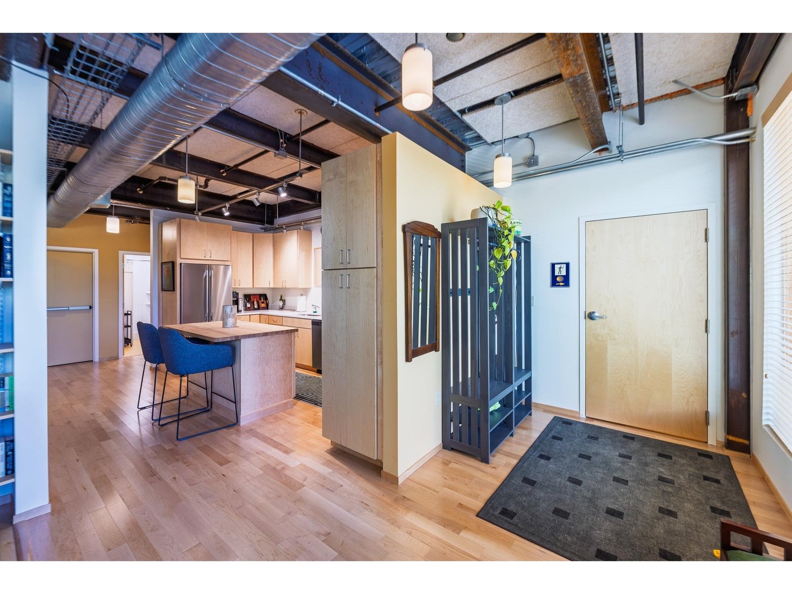 Formal entryway with view of the kitchen
