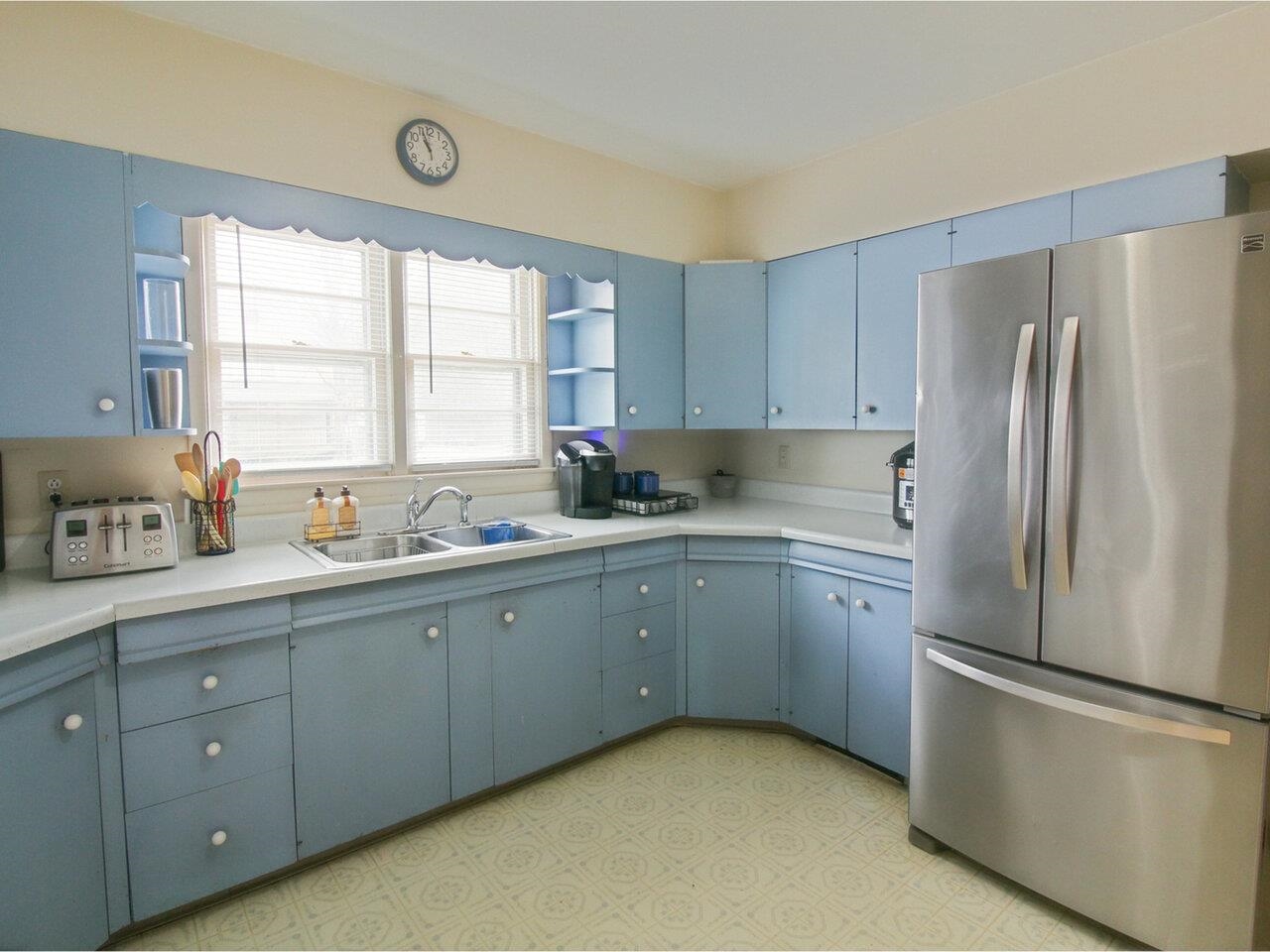 Kitchen with Stainless Fridge