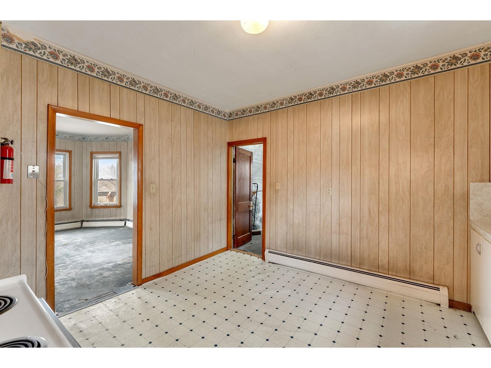 Brown door leads to unfinished bonus room